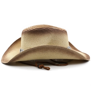Detail of gradient straw cowboy hat with vintage metal buckle and braided chin strap