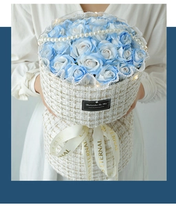 Detail of soap rose bouquet in tweed gift box with LED lights and pearl chain