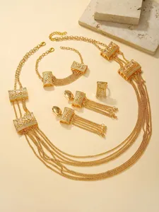 Detailed view of Middle Eastern gold-plated multi-layer tassel necklace and jewelry set