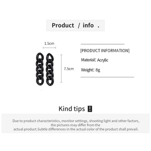 Detail view of black acrylic chain earrings showing 7.5cm length and 1.5cm width dimensions