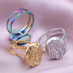 Three-piece set of adjustable geometric stainless steel rings in gold, silver, and rainbow