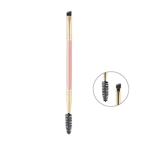 Dual-ended pink eyebrow brush with angled bristle head and spoolie for lash styling