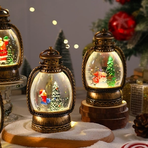 Close-up of a vintage bronze Christmas lantern with a Santa Claus snow globe scene