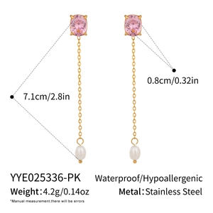 Detailed view of long tassel earrings with pink zircon, white pearl, and dimensions shown
