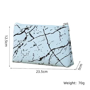 Detailed view of marble pattern PU makeup bag with dimensions 23.5x12.5x5cm