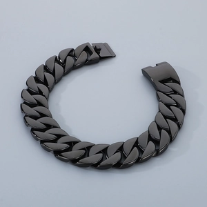 Detailed view of the bold 31mm black cuban link chain in vacuum plated stainless steel