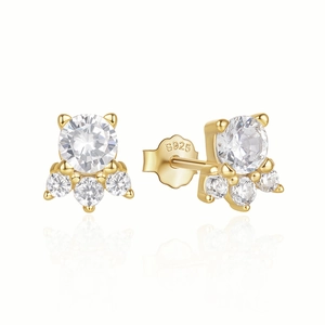 Macro view of S925 sterling silver stamp on gold flower stud earrings with zircons