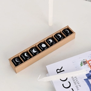 Modern black ceramic moon candle holders set of eight in minimalist packaging