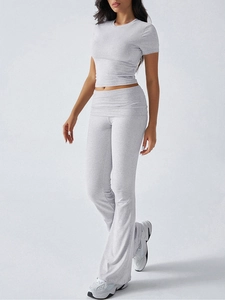 Detail view of women's short sleeve top and flare pants set in grey soft cotton blend