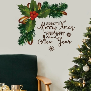 Christmas wall decal with holly leaves and New Year greetings over a velvet sofa