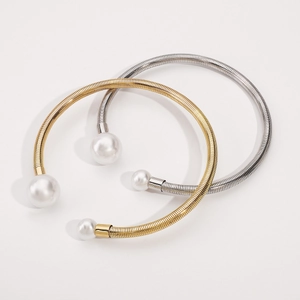 Minimalist flexible spring metal neck collars in gold and silver with pearl ends