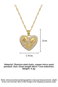 Detailed view of heart-shaped tulip pendant with inlaid diamonds and measurements