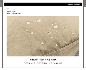 Detail display of waterproof nylon fabric with water droplets on khaki crossbody bag