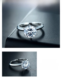 Macro side view of S925 sterling silver six-prong setting and round sparkling diamond
