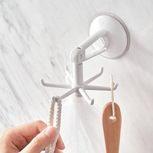 Rotating six-claw suction cup hook in white plastic for drill-free kitchen storage