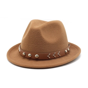 Detail of brown wool fedora with leather band and decorative gold metal buckle