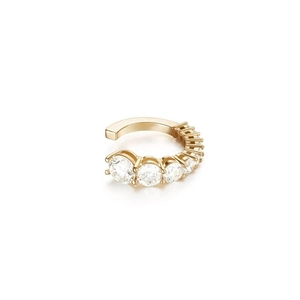 Detailed view of C-shaped gold ear cuff featuring five prong-set round brilliant cut zircons