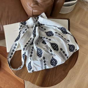 Ethnic bohemian linen tote bag with black lotus embroidery and wide shoulder strap