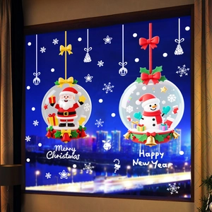 Close-up of Merry Christmas static window stickers with Santa and snowman on glass