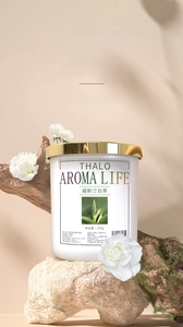 Detailed view of THALO car aromatherapy solid balm in white jar with Westin White Tea scent