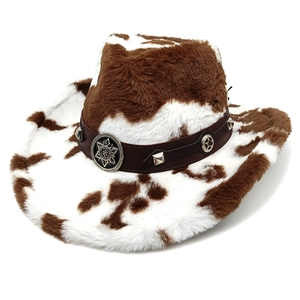 Detail of western cow print plush hat featuring faux leather band and metallic star studs