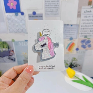 Pince à cheveux licorne pailletée pour filles avec sequins sur carte d'affichage