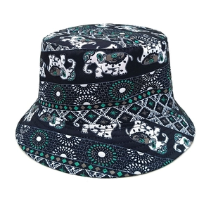Detailed close-up of elephant and mandala prints on the cotton bucket hat fabric