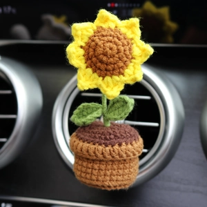 Handmade crochet sunflower car air vent clip ornament with yellow petals and pot