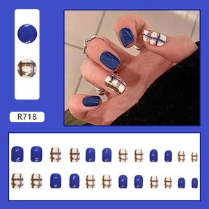 Short square press-on nails featuring royal blue and brown plaid patterns in 24 sizes