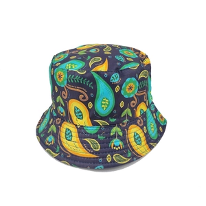 Close-up of bohemian paisley floral pattern and stitching on a navy bucket hat