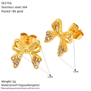 Detail of 18K gold plated bow earrings with size 12mm and waterproof steel feature