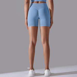 Detail view of high waist seamless yoga shorts with scrunch butt lift and V-shape design