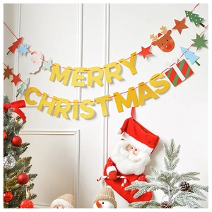 Detail of glittery Merry Christmas bunting with Santa and reindeer on a white wall