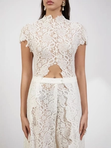 Elegant white floral lace two-piece set featuring short sleeve top and wide leg pants