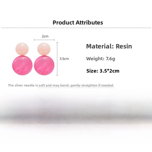 Detail showing dimensions of 3.5x2cm and 7.6g weight for the pink resin hoop earrings