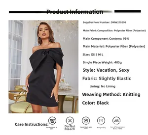 Détail de la robe bustier noire avec nœud papillon géant et texture en maille douce