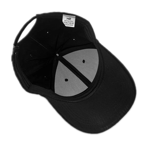 Internal view of a classic solid black cotton baseball cap showing adjustable strap.