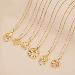 Selection of golden Mom necklaces with heart pendants and sparkling crystals
