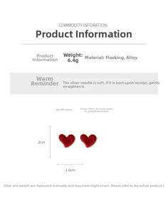 Detail view of red flocked heart earrings showing 2cm height and silver needle posts