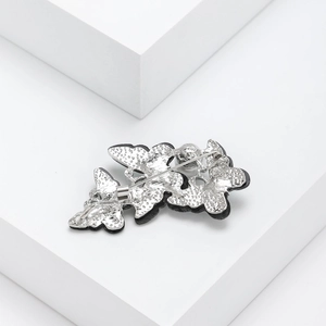 Elegant silver butterfly brooch with natural abalone shell inlay and pin closure