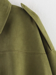 Detail of army green bomber jacket collar and stitching on premium suede fabric