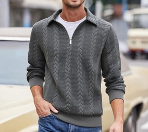 Detailed view of gray cable knit sweater with polo collar and half-zipper for men