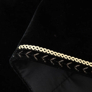 Ethnic style black velvet vest with gold sequin embroidery and intricate beadwork details