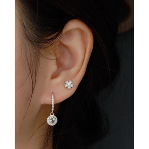 French vintage S925 sterling silver floral zircon stud earrings worn on earlobe