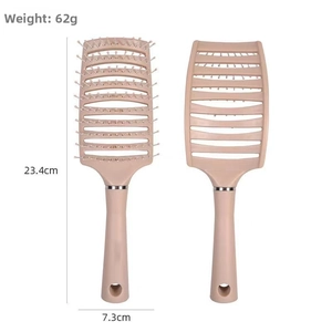 Pink curved vented hairbrush with ergonomic handle and round massage bristles