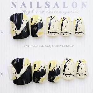 Retro black and beige marble print press-on nails with gold glitter and short square shape