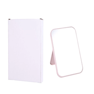 Pink minimalist desktop makeup mirror with stand and matching white packaging box