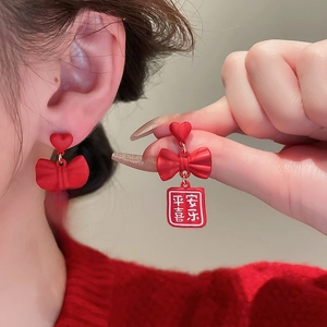 Red bow and heart earrings for Lunar New Year with lucky Chinese characters