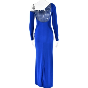 Detail view of the elegant backless design on this long-sleeved blue evening dress
