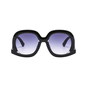 Fashionable oversized irregular black sunglasses with purple gradient lenses for women